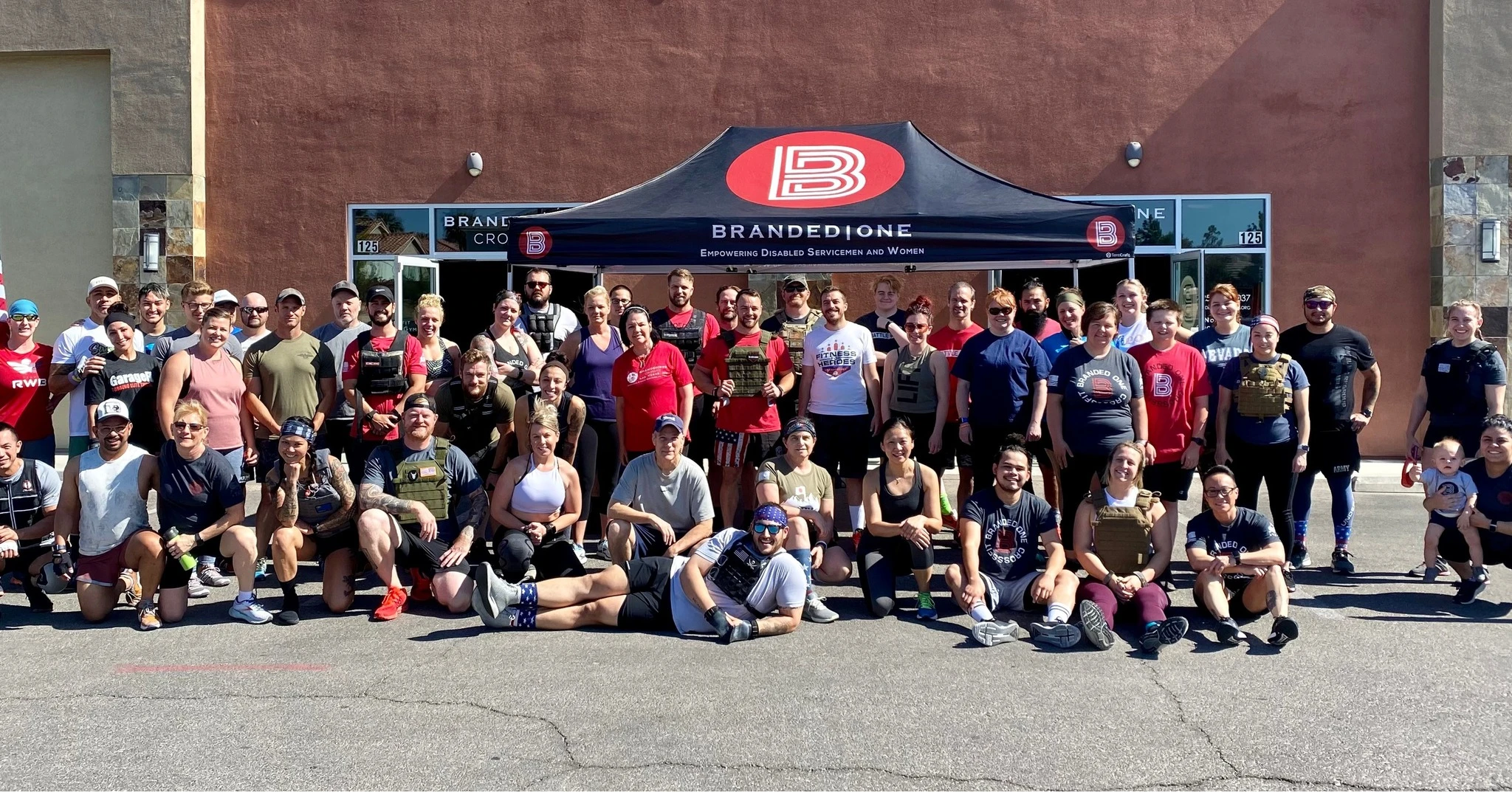 Group Photo of Branded One members outside the gym